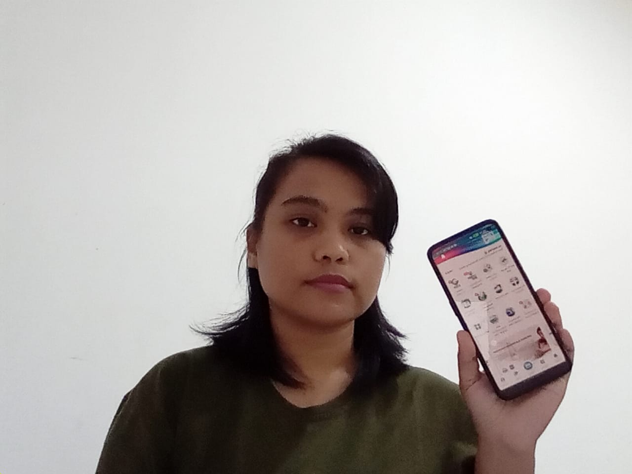 Salah seorang peserta JKN di Manokwari, Ristra Christanti mengungkapkan pengalamannya memanfaatkan Aplikasi Mobile JKN